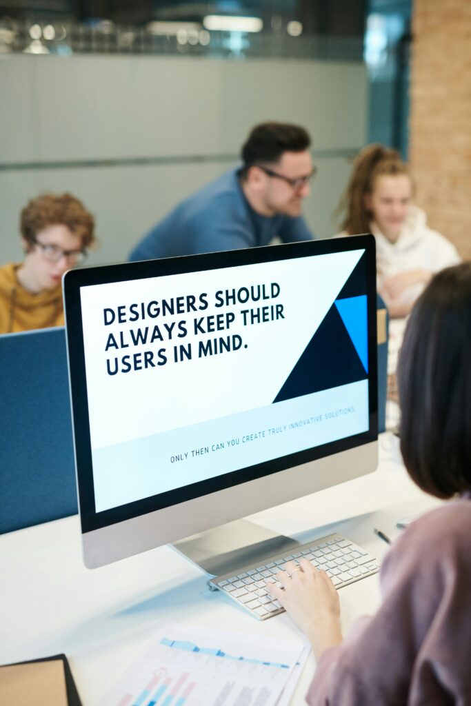 pexels-photo-3184455-3184455 Group of designers collaborating in modern office space with computer.
